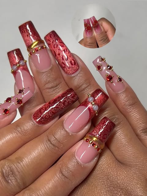 Long square burgundy glitter nail set with gold and crystal accents
