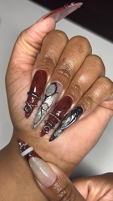 Long sculptural nails in chocolate brown and silver chrome with dimensional details